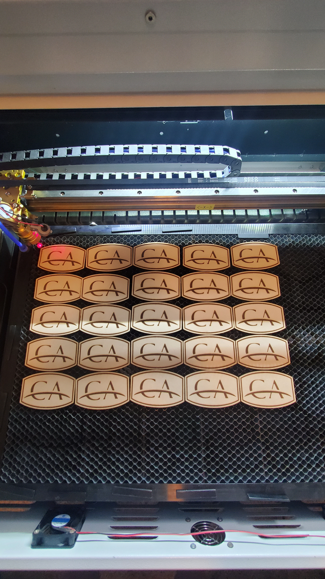 CA — Leather patches on the laser · engraved logo run
