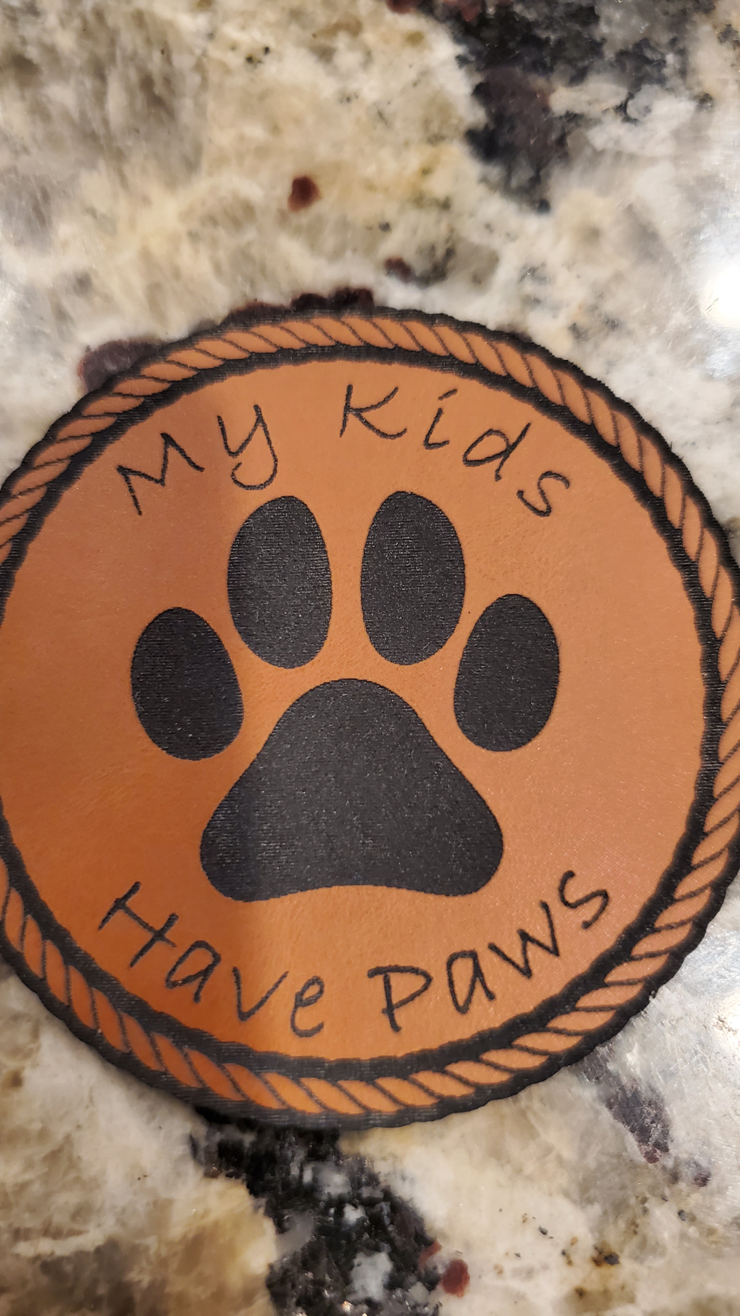 Personalized Gift — Round leather coaster · engraved paw design