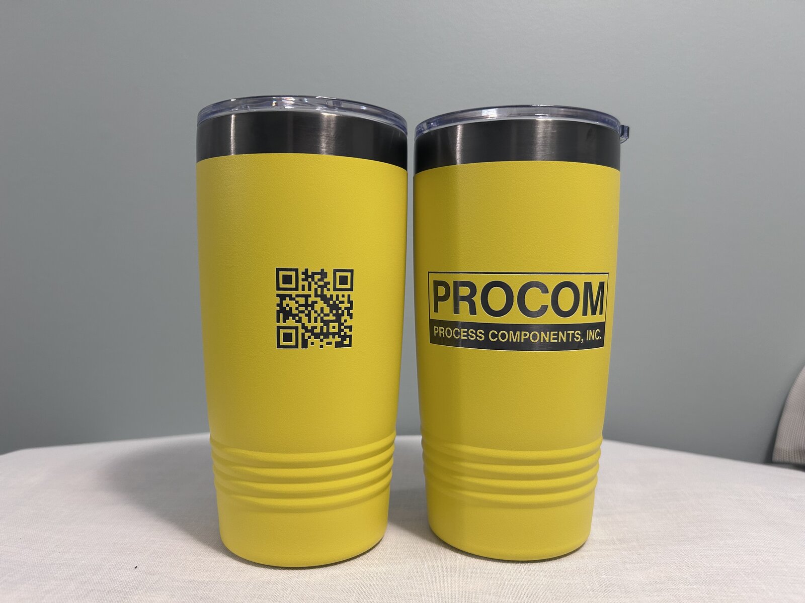 Procom — Yellow 20oz tumblers · logo one side, scan code the other
